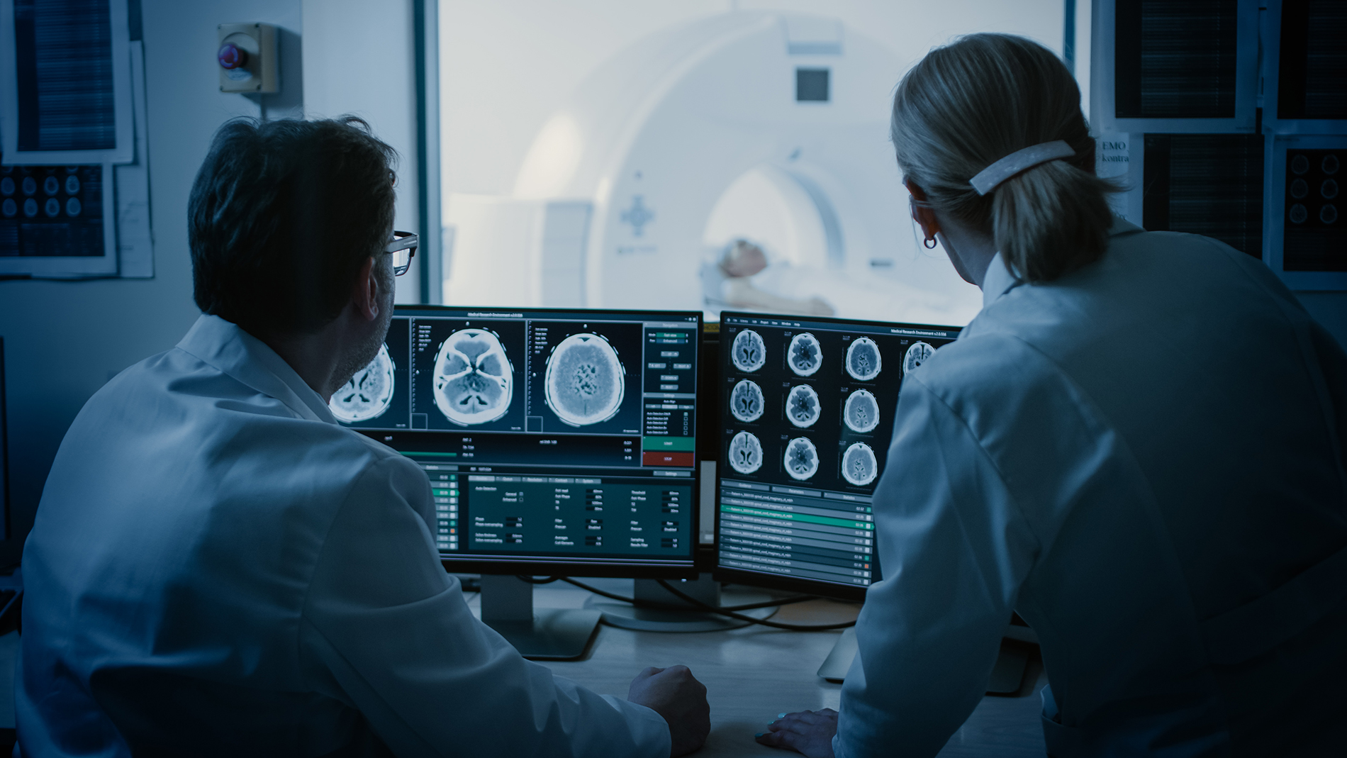 Health professionals performing an MRI