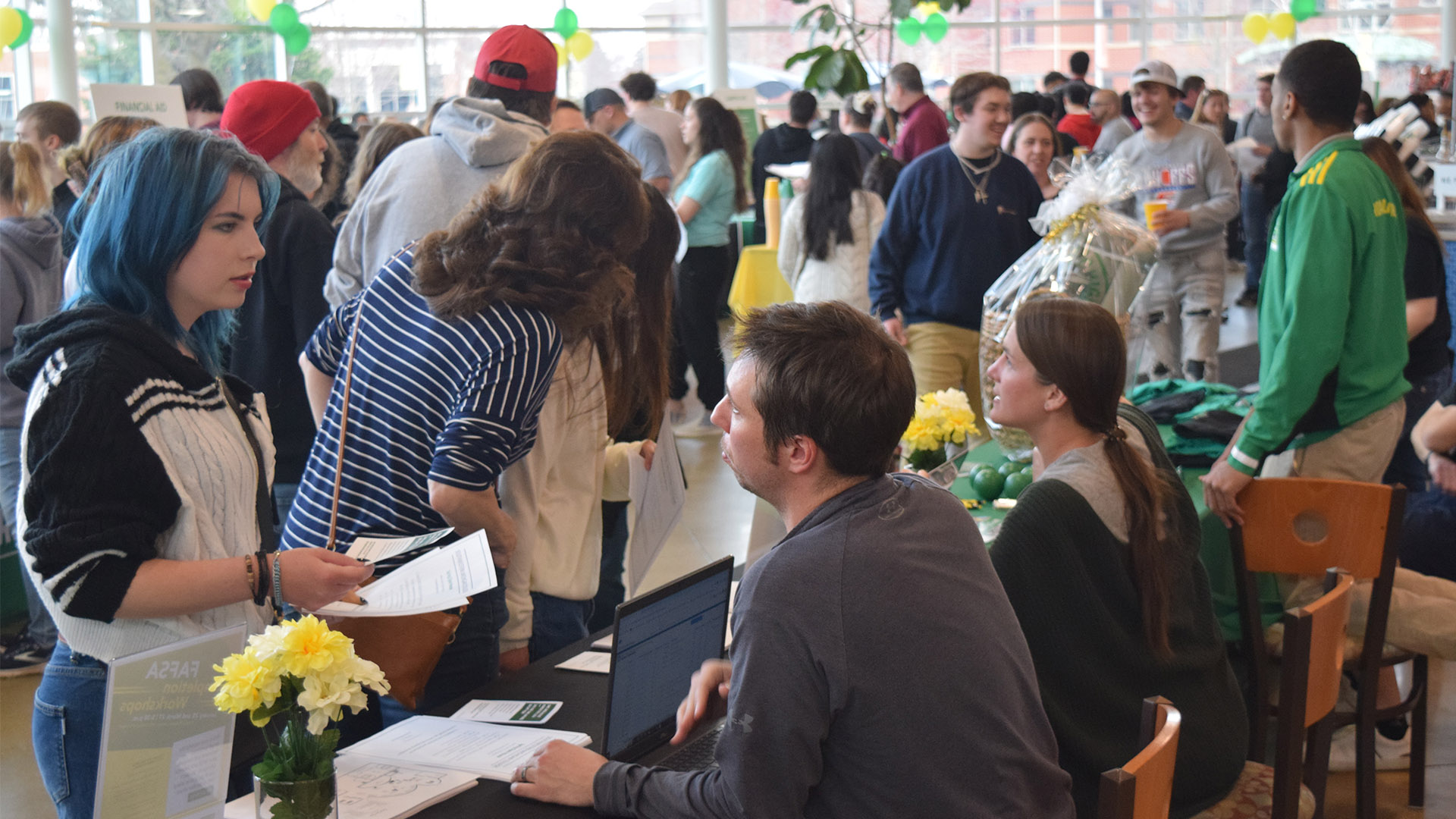 Prospective students checking out the information tables at the SMC Open House.