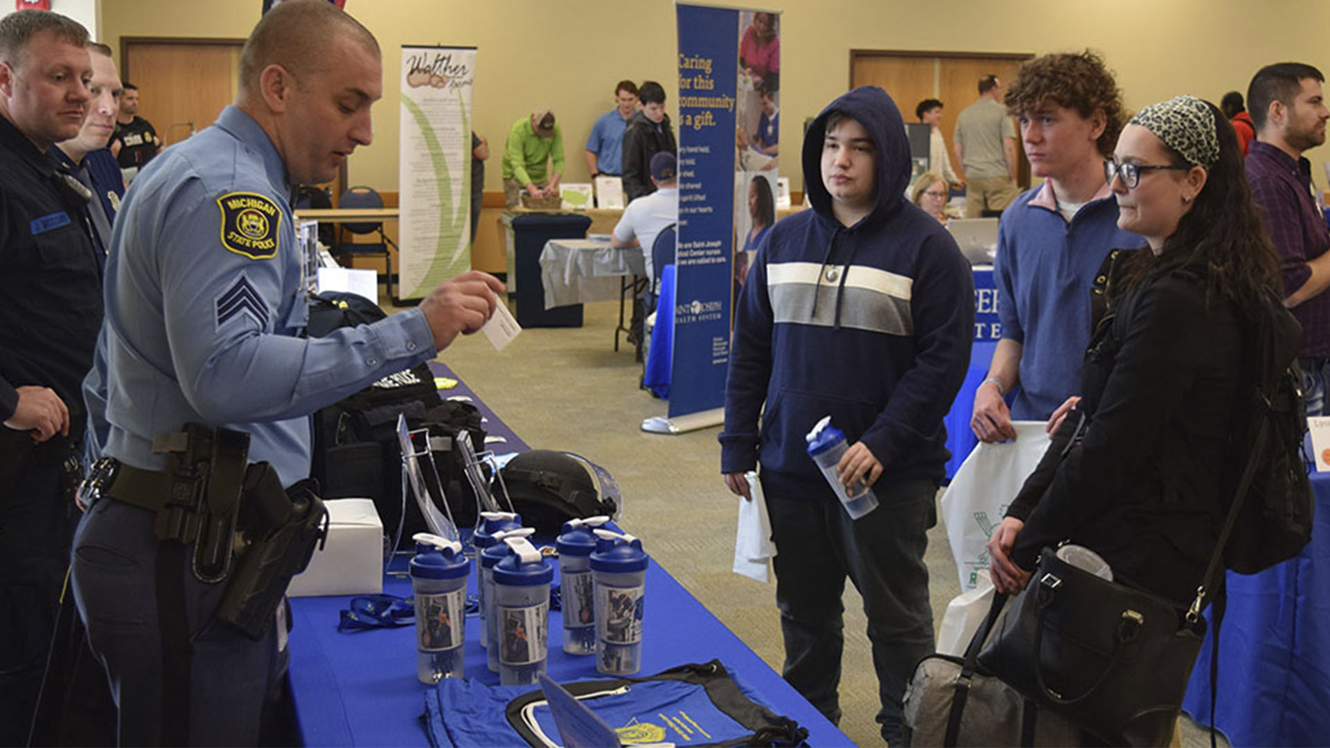 Students interacting with companies at career fair