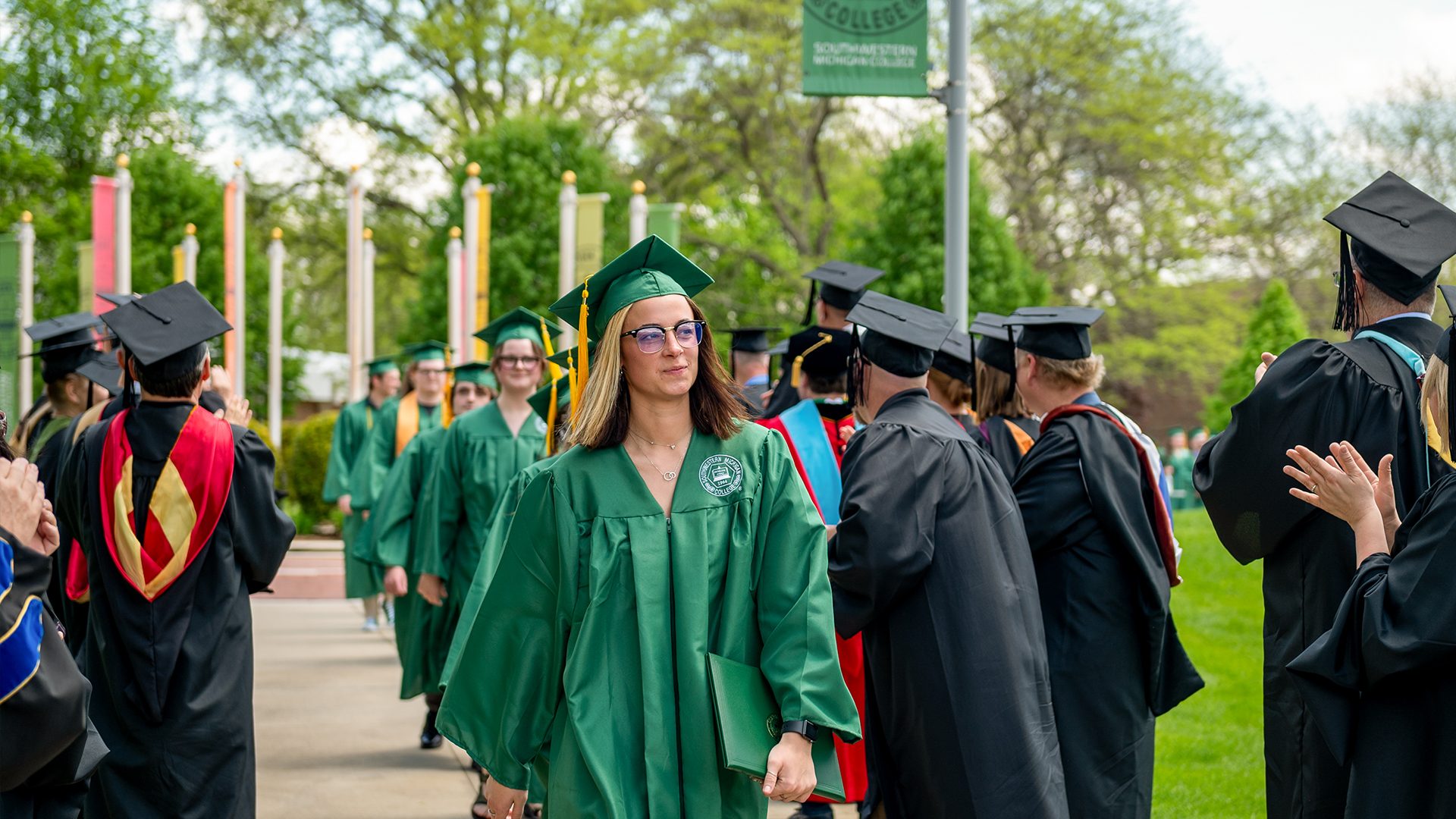 Graduates exiting the commencement ceremony