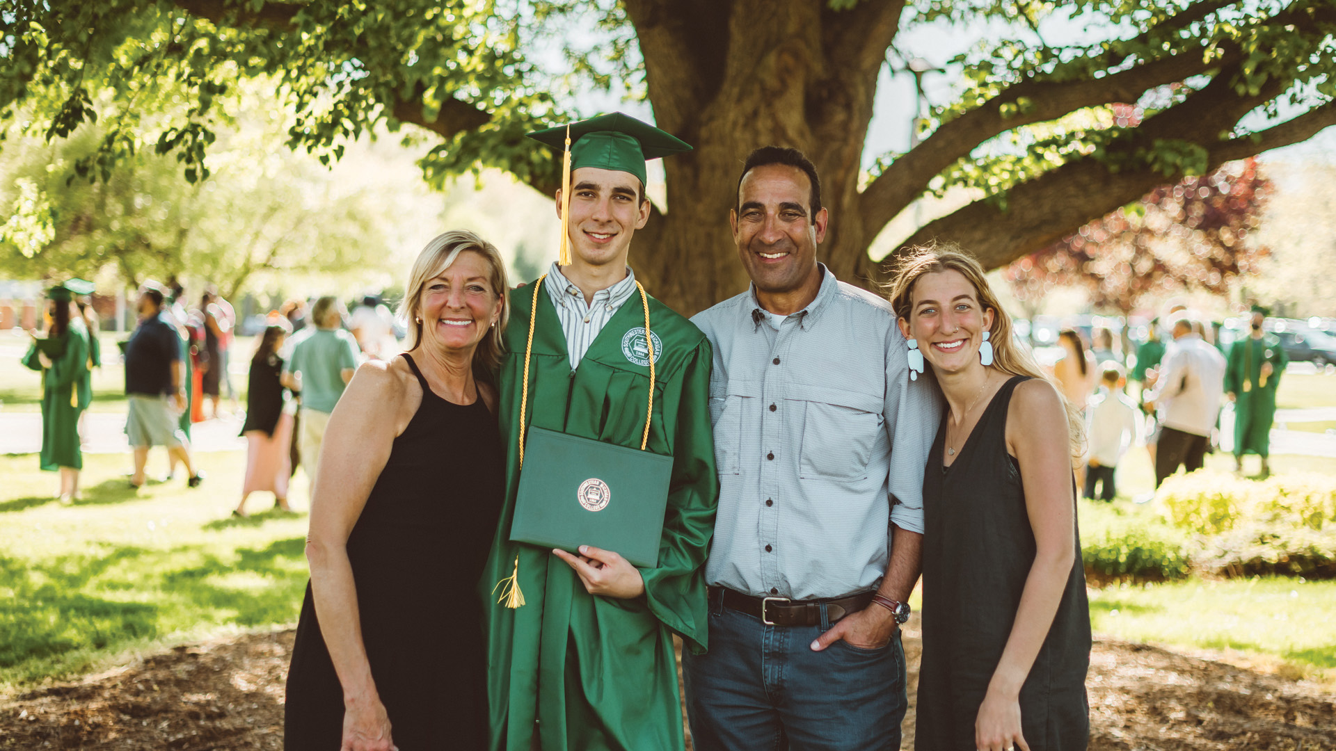 Graduate with his family