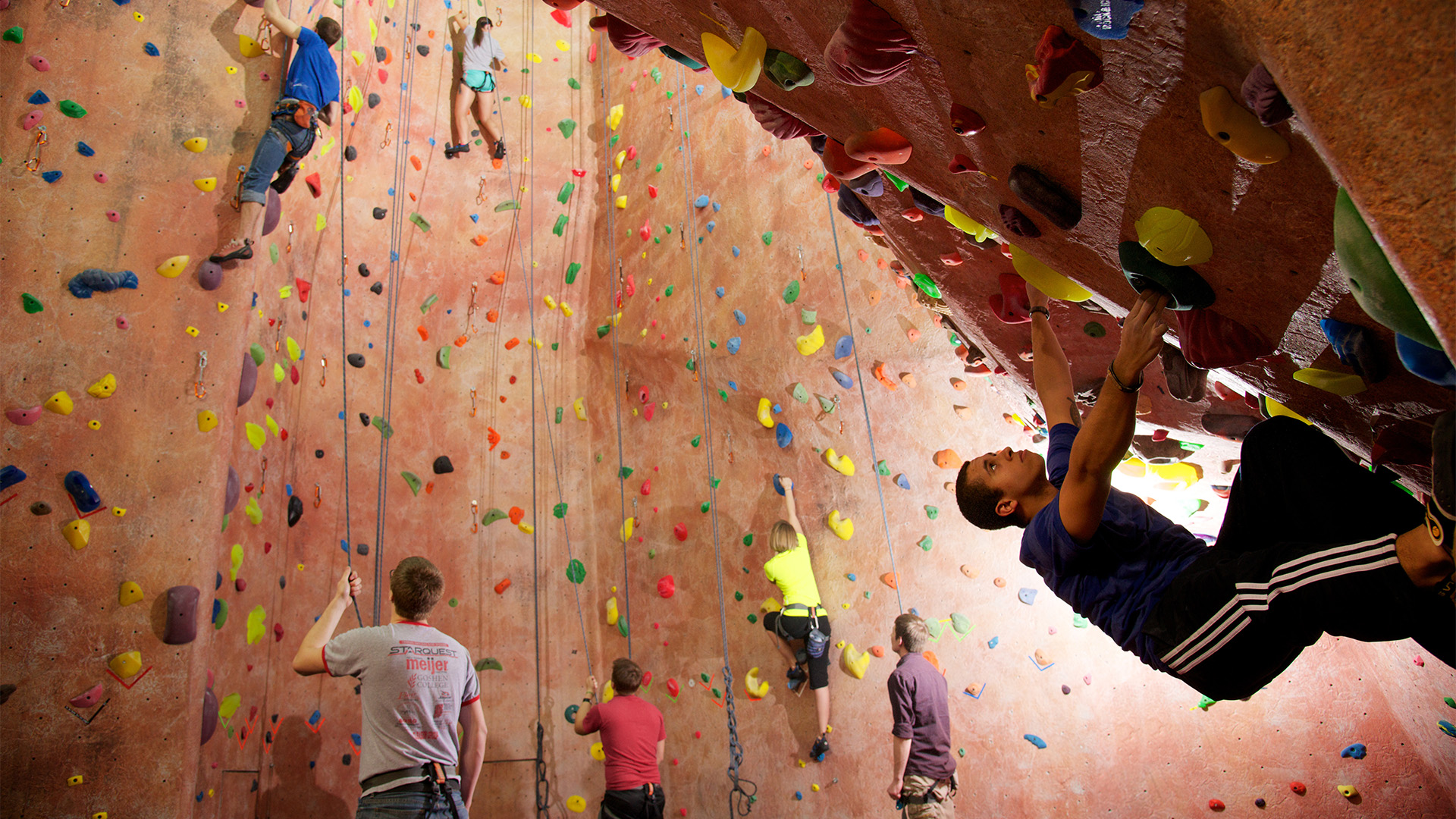 Student climbing in the SAC Rock Climbing room