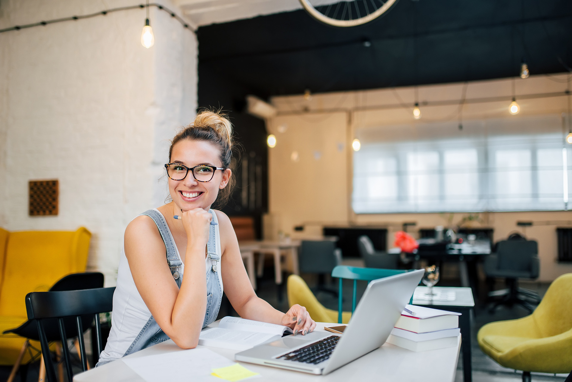 Woman working on a computer in a office area