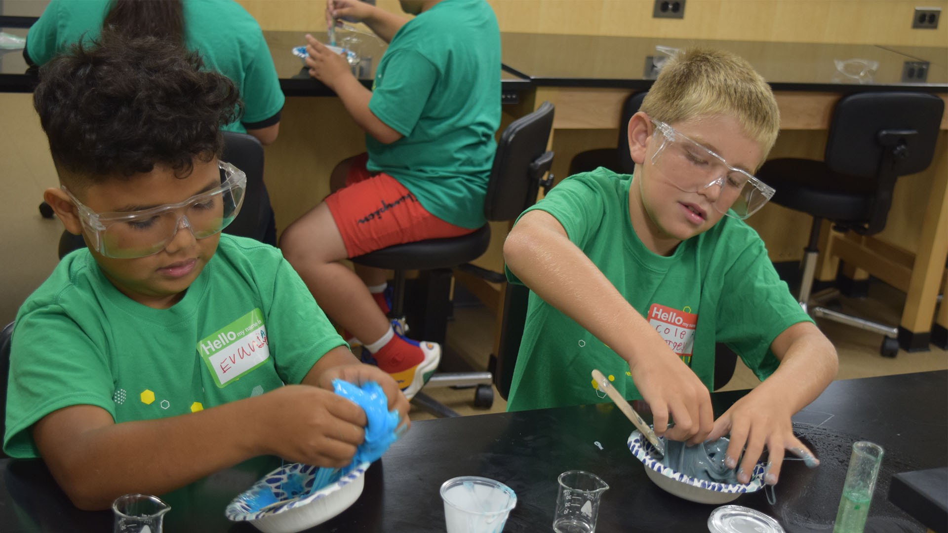 Students in STEM Camp learn as they experiment.