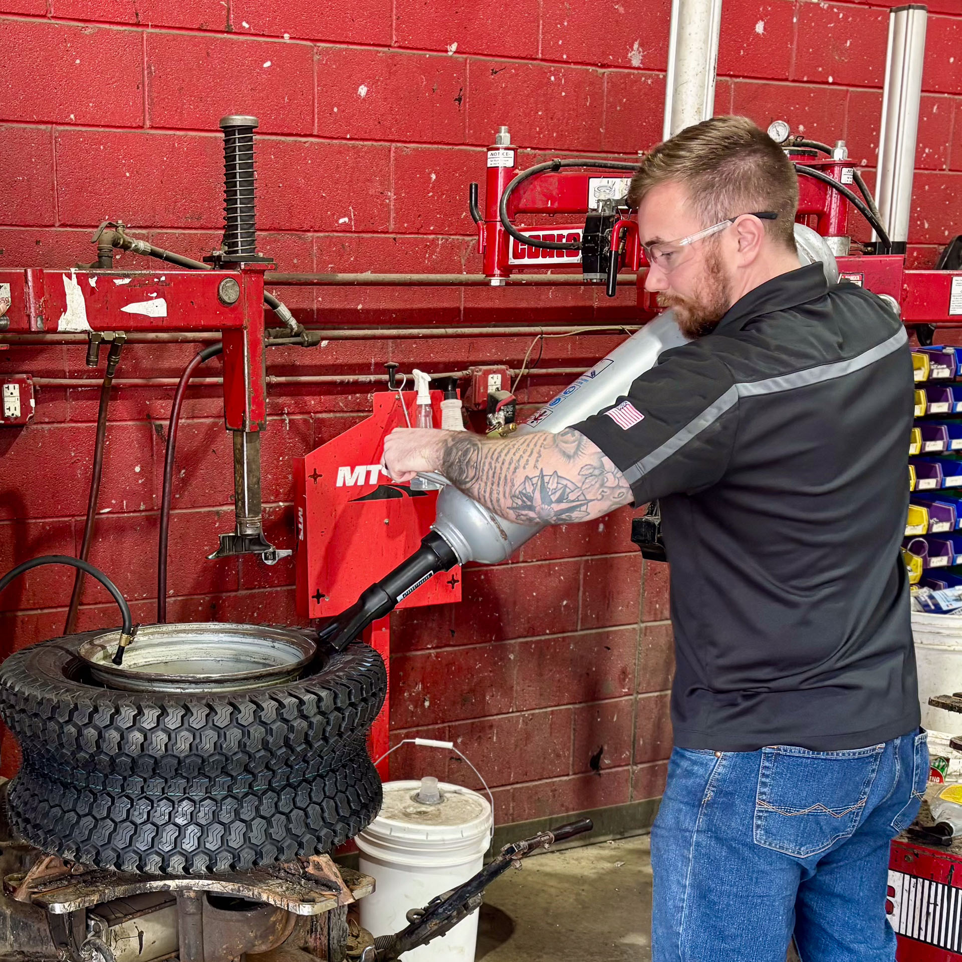 Alex started slinging tires and changing oil on Monroe Street in downtown South Bend