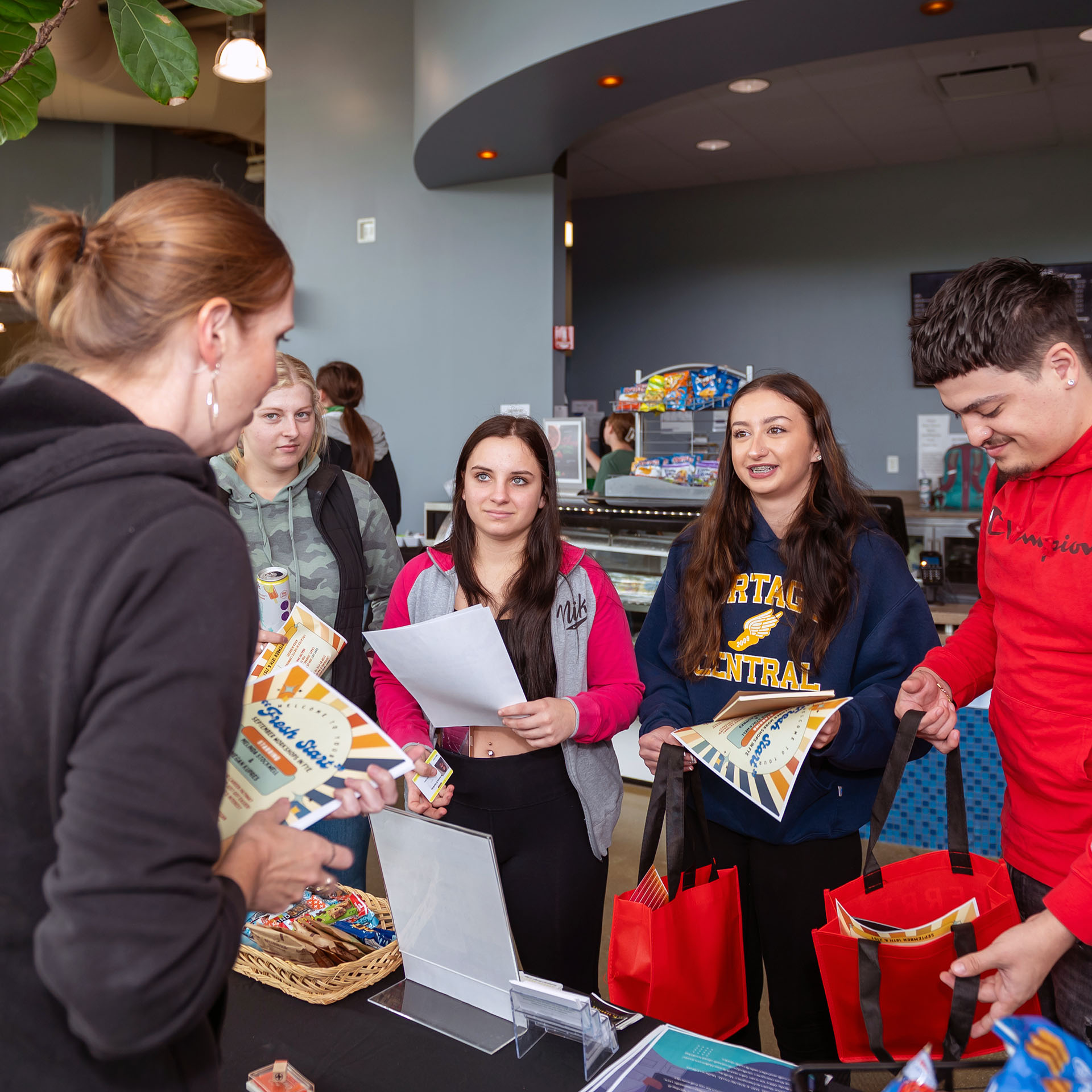 Courtney Hemenway talks to students at Campus Bash