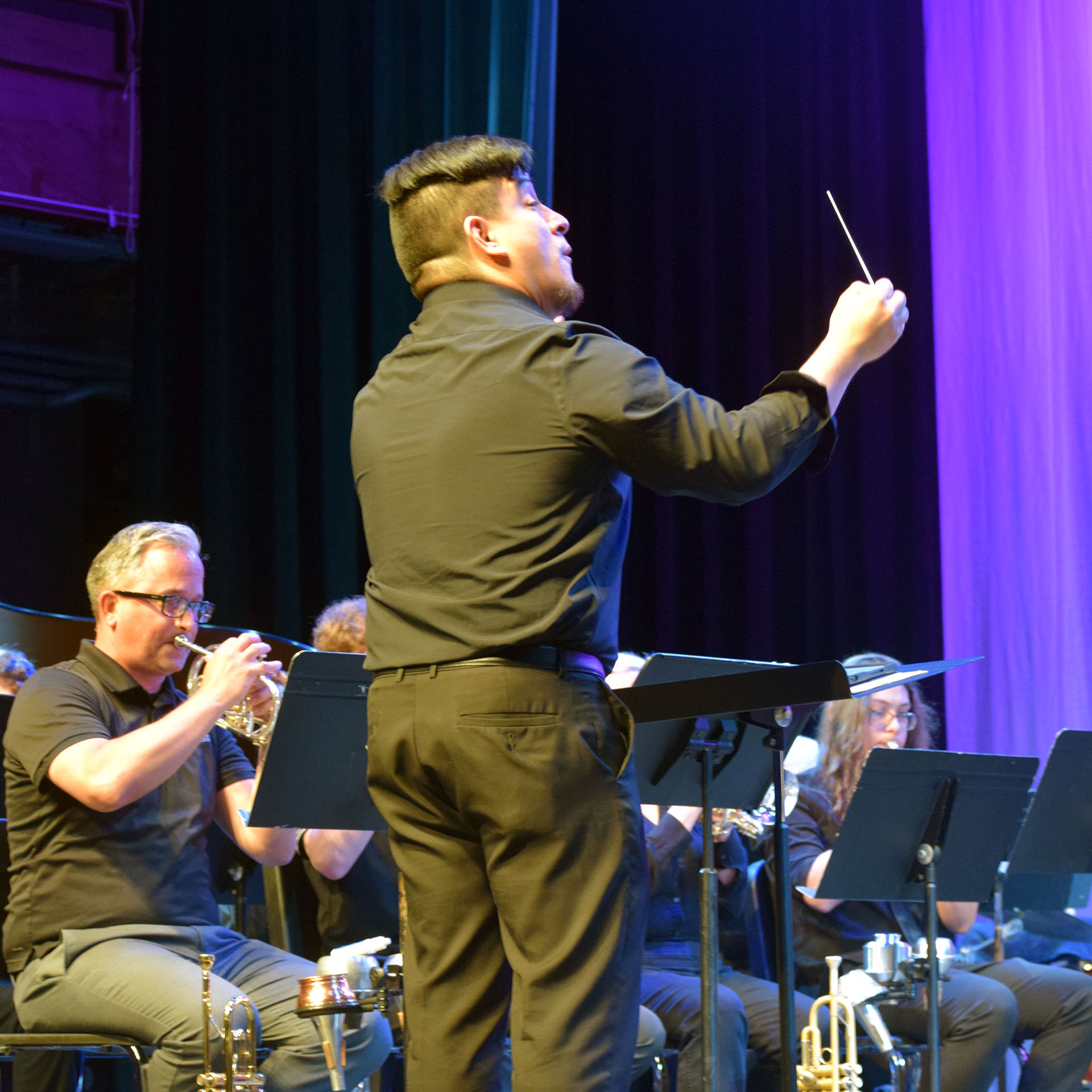 Professor of Trumpet Danny Lopez directs the Brass Band