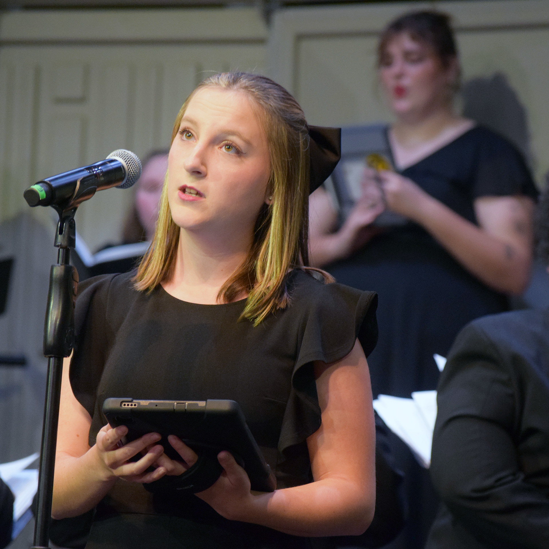 Lauren solos at fall choral concert, 