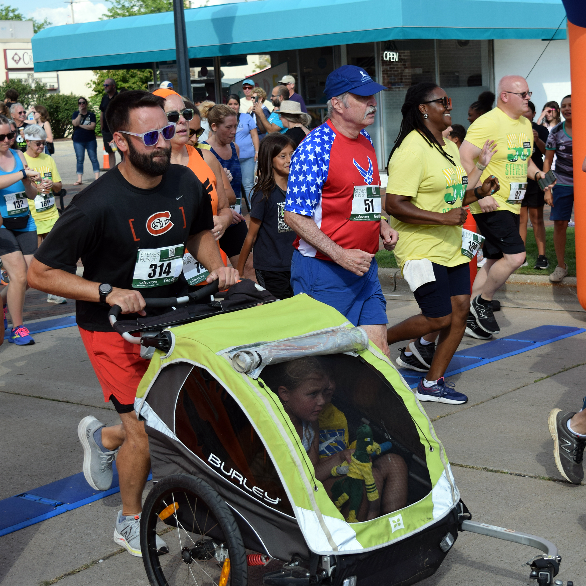 Stroller dad at start of race