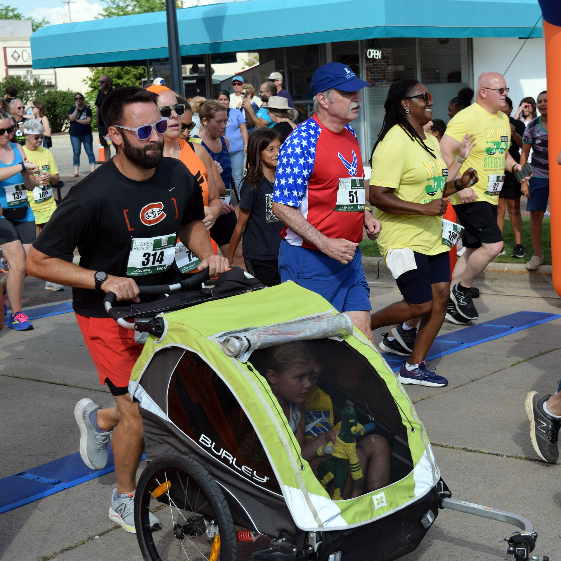 Stroller dad at start of race