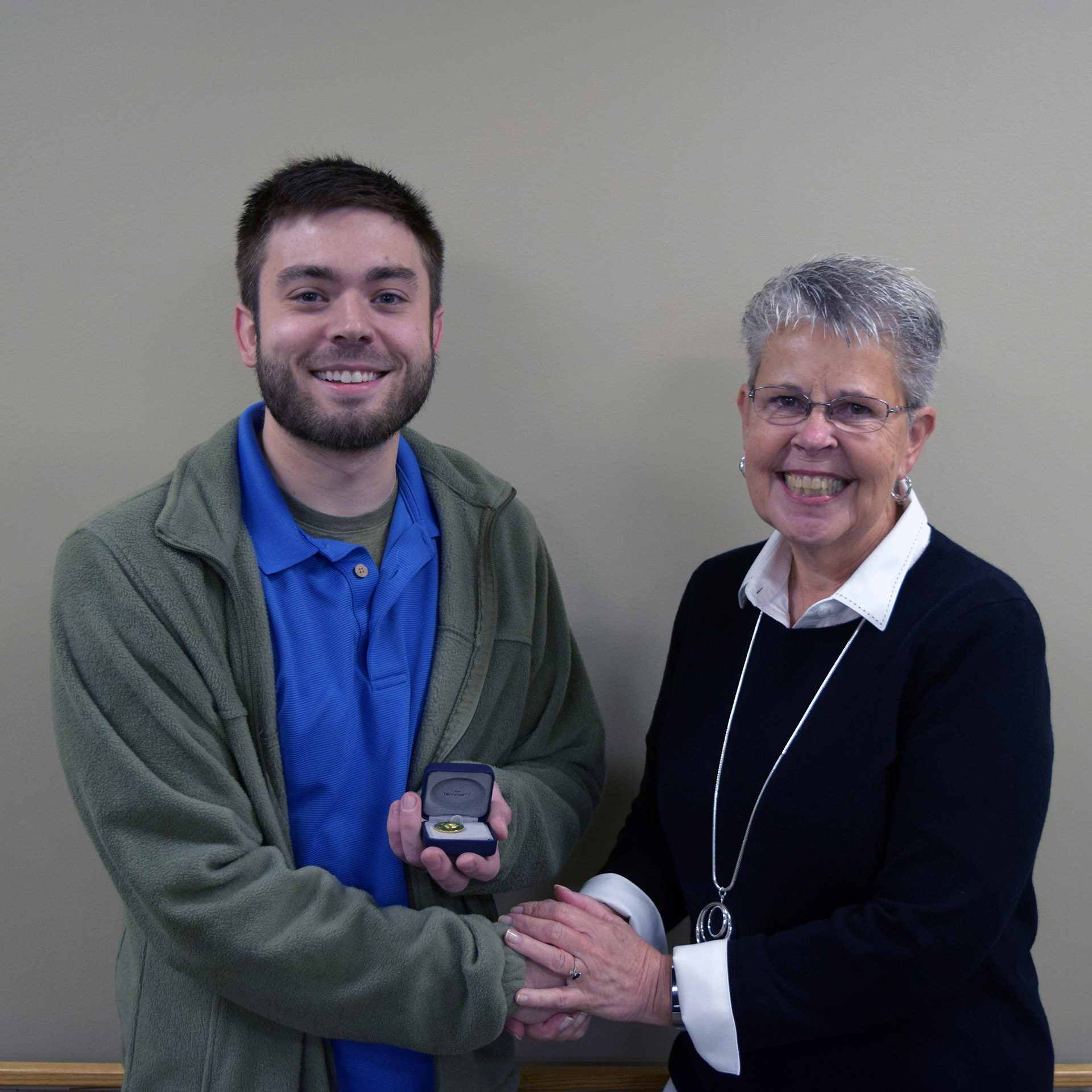 OIT Technical Event Coordinator Tyler Young, Trustee Becky Moore