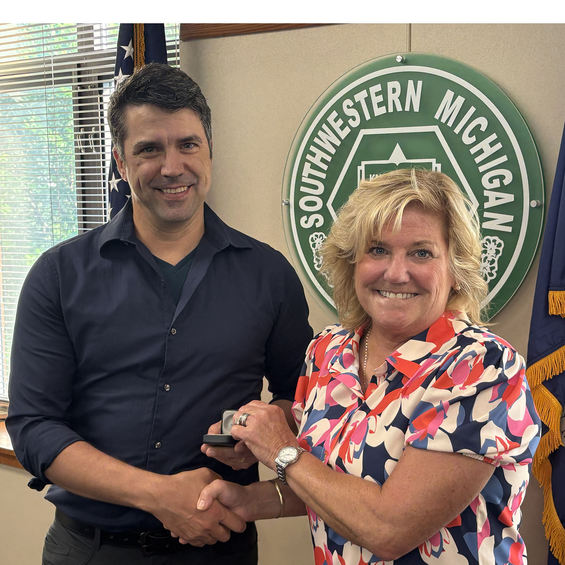 Coach Zac Sartori, Trustee Beth Cripe